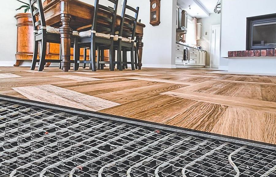 Plancher chaud sous le stratifié